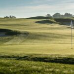 Overhead view of golf green showing slope lines and terrain architecture_The Sunday Golf