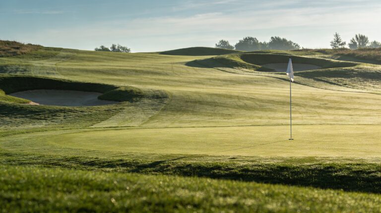 Overhead view of golf green showing slope lines and terrain architecture_The Sunday Golf